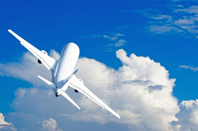 aircraft climb flight against cumulus clouds sky 400w
